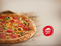 O nouă experienţă culinară de la Pizza Hut: pizza pe blat multicereale
